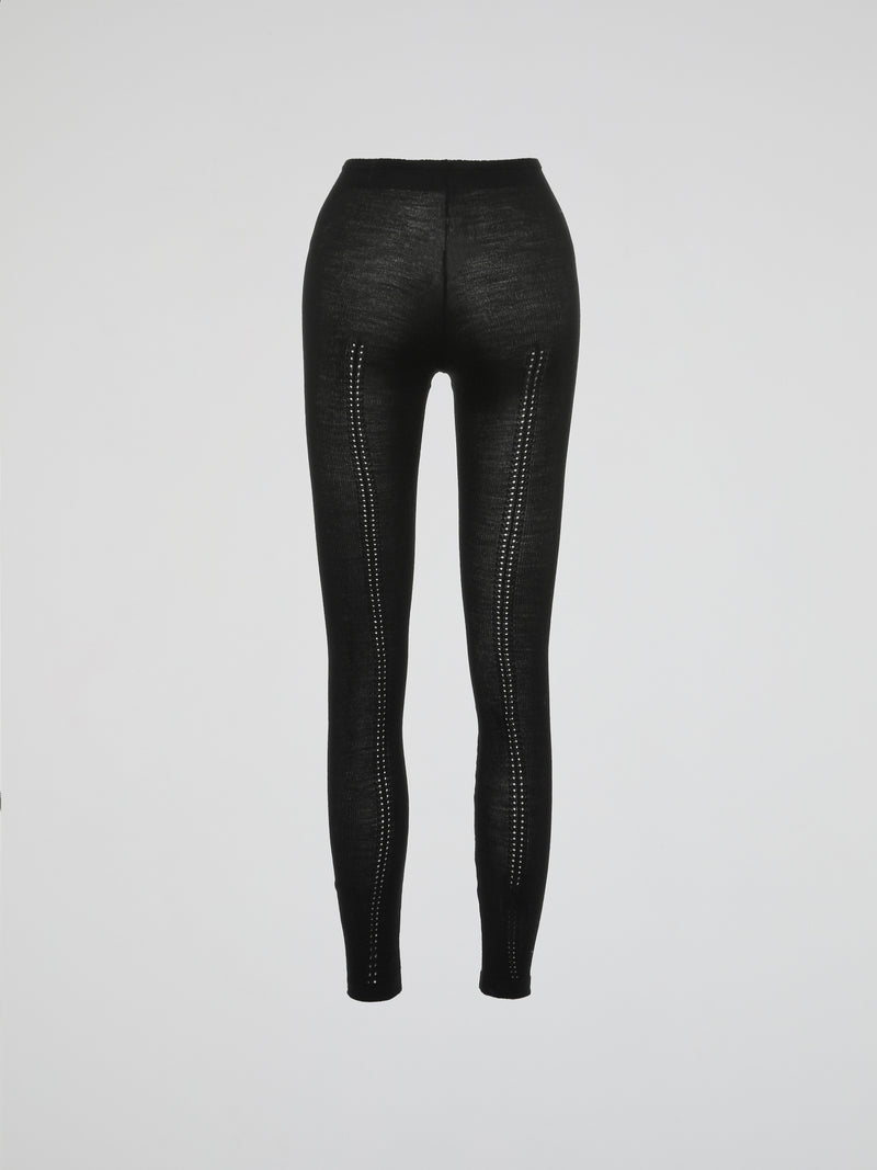 Introducing the epitome of luxurious comfort - the Black Knitted Leggings by Roberto Cavalli. Crafted with meticulous attention to detail, these leggings blend fashion-forward style with unmatched coziness. Perfect for lounging at home or turning heads on the street, these leggings are a versatile addition to your wardrobe that you won't be able to resist slipping into.