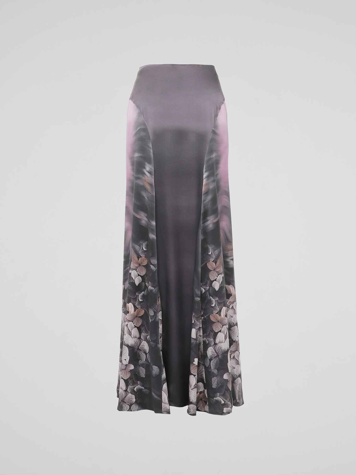 Step into the whimsical world of fashion with the Floral Print Maxi Skirt by Roberto Cavalli. Designed to turn heads and ignite a sense of romanticism, this skirt is a true masterpiece of elegance. With its vibrant floral patterns and flowing silhouette, it effortlessly combines style and grace, making every step feel like a dream-worthy catwalk.