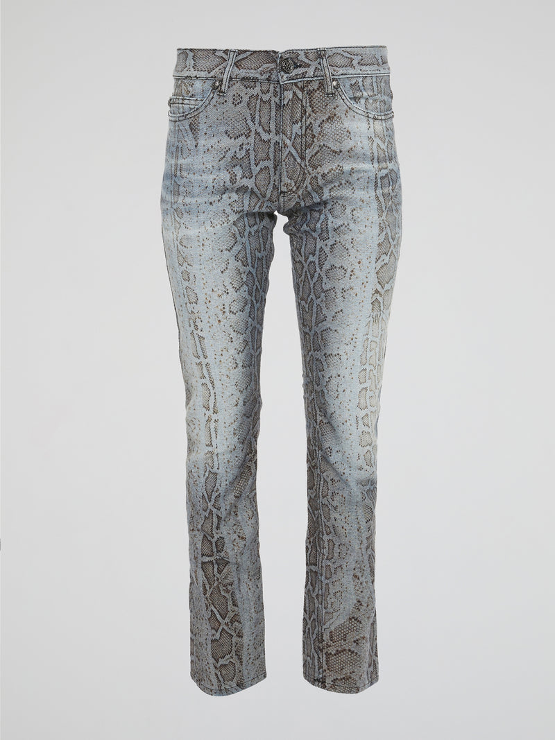 Unleash your wild side with the Roberto Cavalli Snake Print Denim Jeans, a bold and daring addition to your wardrobe that will turn heads wherever you go. Crafted from high-quality denim, these jeans feature a sleek snake print design that adds a touch of edgy sophistication to any outfit. Embrace your inner fashionista and elevate your style with these statement-making jeans that are sure to make you stand out from the crowd.