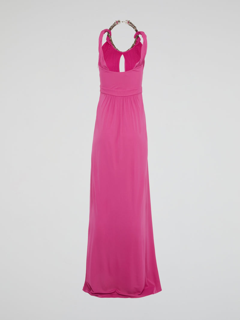 Channel your inner goddess in this stunning Pink Crystal Embellished Halter Neck Maxi Dress by Roberto Cavalli. The luxurious crystals add a touch of glamour to the flowy silhouette, making it perfect for any special occasion. Stand out from the crowd and turn heads wherever you go in this show-stopping piece.