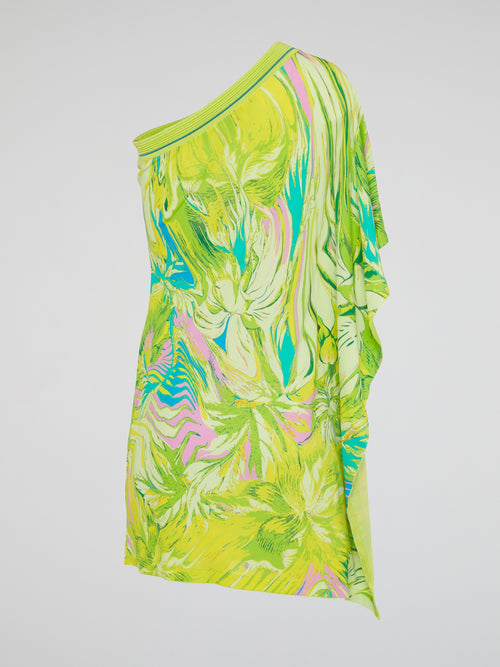 Embrace your bold and adventurous side with this vibrant green printed asymmetrical mini dress by Roberto Cavalli. The unique design is sure to turn heads and make a statement wherever you go. Express your personal style and stand out from the crowd in this traffic-stopping piece.