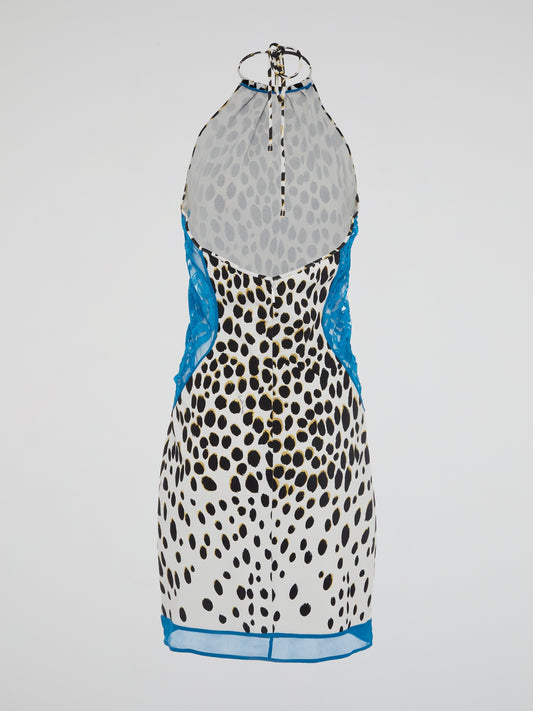 Unleash your inner wild side with our stunning Leopard Print Halter Neck Dress by Roberto Cavalli. This fierce and fabulous piece exudes confidence and sophistication, making it perfect for any special occasion or night out. Stand out from the crowd and turn heads wherever you go in this show-stopping statement dress.