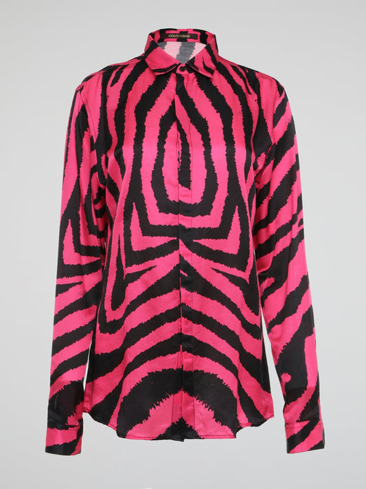 Let your wild side shine with this stunning Pink Zebra Print Shirt by Roberto Cavalli, crafted for the fashion-forward individual who dares to stand out from the crowd. Made with luxurious materials and impeccable attention to detail, this shirt is a bold statement piece that exudes confidence and style. Embrace your inner fashionista and make heads turn wherever you go with this eye-catching and trendy wardrobe essential.