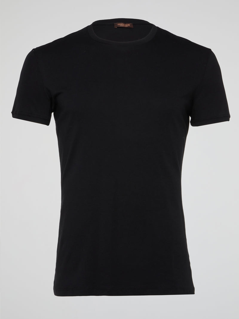 Experience the epitome of sophistication and style with our black logo print round neck t-shirt from Roberto Cavalli Underwear. Made with the finest materials and designed with meticulous attention to detail, this t-shirt is perfect for those who appreciate luxury and quality in their wardrobe. Stand out from the crowd and make a bold statement with this timeless piece that exudes confidence and elegance.