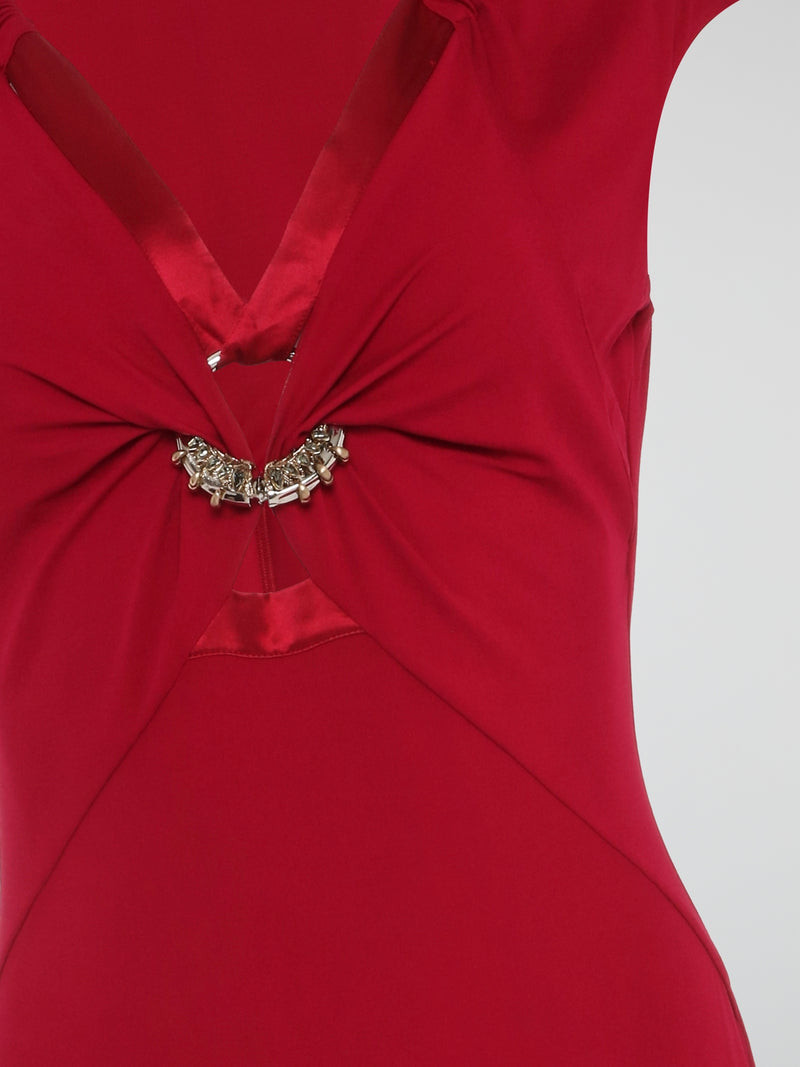 Turn heads wherever you go with the Red Embellished Bodycon Dress by Roberto Cavalli. This statement-making stunner features intricate embellishments that beautifully catch the light, adding a touch of glamour to your every move. With its figure-hugging silhouette and bold red hue, this dress is the perfect choice for making a lasting impression at any special occasion.