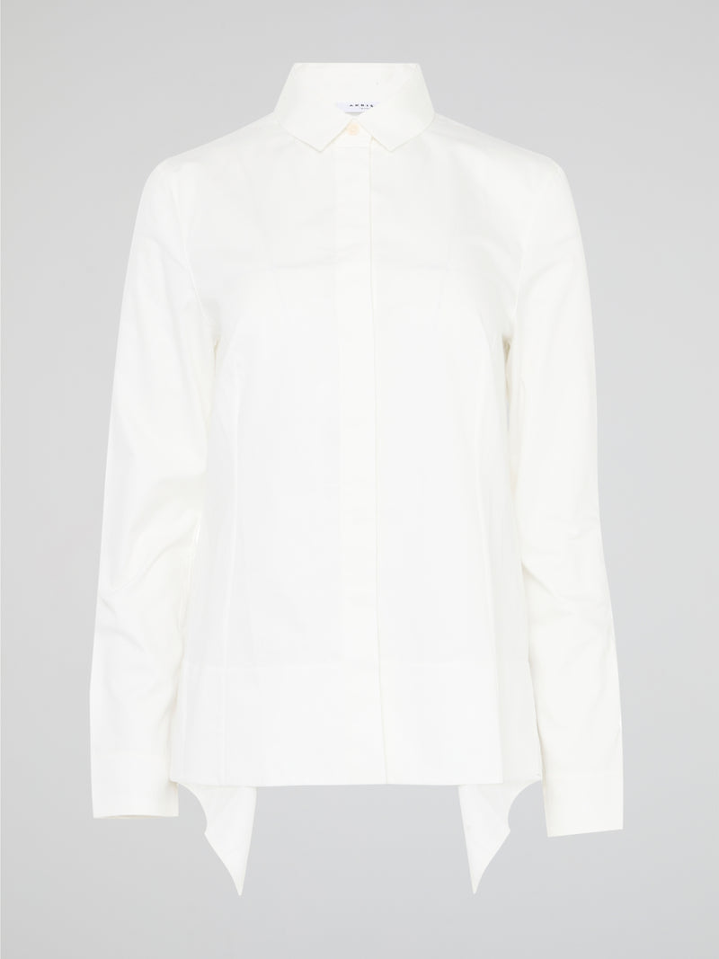 Turn heads and make a statement with the White High-Low Shirt from Akris Punto. Crafted with impeccable attention to detail, this modern twist on a classic silhouette is designed to elevate your style game. With its dynamic high-low hemline and luxurious fabric, this shirt is the epitome of effortless sophistication, perfect for any occasion.