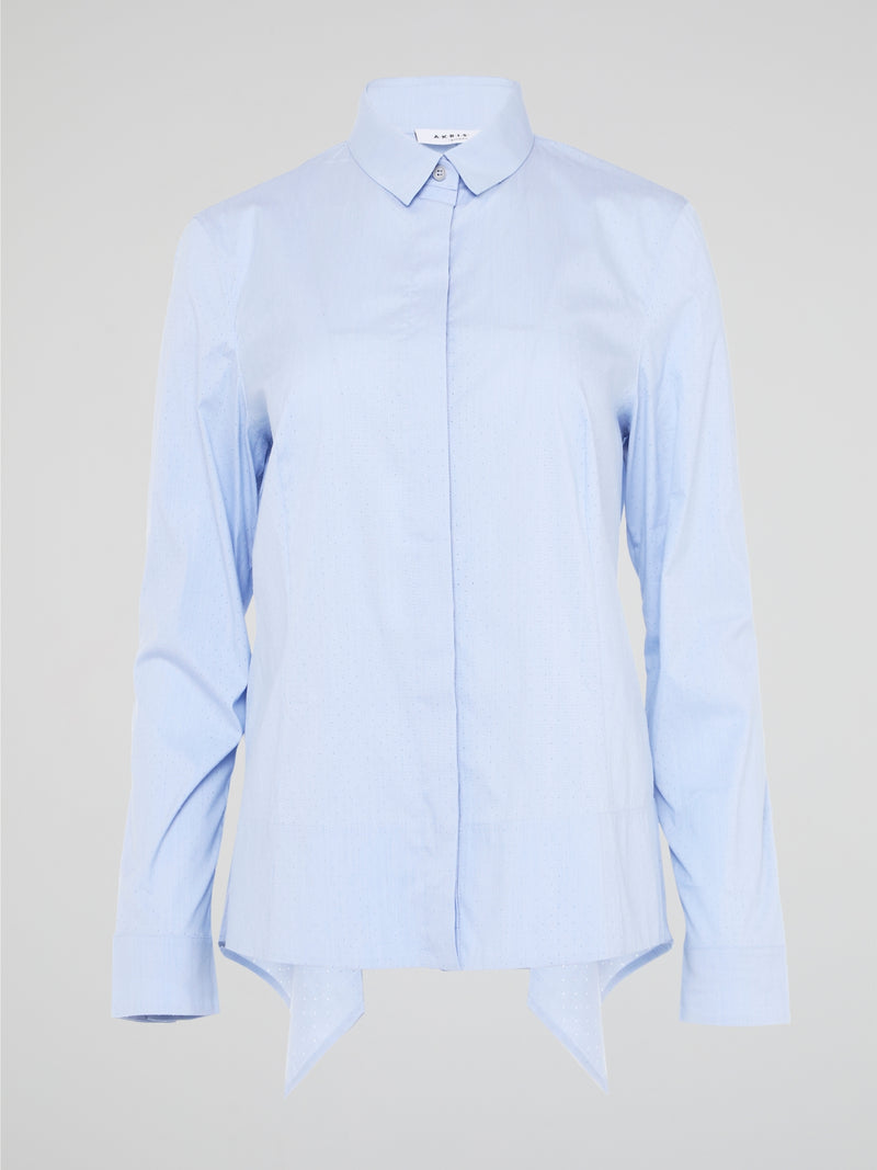 Introducing the Powder Blue High-Low Shirt by Akris Punto, where elegance meets contemporary style. Delicate powder blue hue cascades down the front, enveloping you in a calming wave of tranquility. With its unique high-low hemline and luxurious fabric, this shirt effortlessly elevates any outfit, making it a must-have piece for the fashion-forward trendsetters.