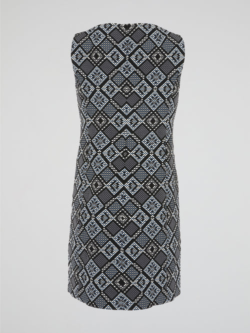 Step into a realm of elegance with our Grey Checkered Mini Dress by Akris Punto, where traditional patterns meet contemporary style. Crafted with precision and attention to detail, this dress showcases a flattering silhouette that effortlessly accentuates your curves. As you glide through any occasion, the sophisticated checkered design exudes confidence and leaves a lasting impression.