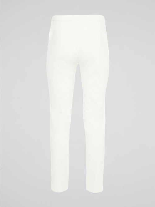 Get ready to turn heads with these stunning White Skinny Fit Trousers by Akris Punto! Designed to flatter every curve, these trousers hug your body in all the right places, giving you a sleek and elegant silhouette. Perfect for both casual and formal occasions, these versatile pants are a must-have addition to your wardrobe!