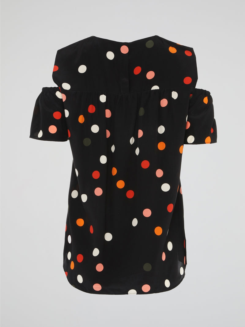 The Black Polka Dot Cold Shoulder Top by Akris Punto is a chic and playful addition to your wardrobe. With its trendy cold shoulder cutouts and flirty polka dot print, this top adds a touch of flair to any outfit. Made with high-quality materials, it offers both comfort and style, making it the perfect choice for a night out or a casual day at the office.