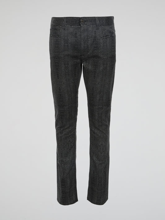 Experience the epitome of style and sophistication with these Black Slim Fit Trousers by Roberto Cavalli. Designed to effortlessly accentuate your silhouette, these trousers are crafted with meticulous attention to detail and precision tailoring. Perfect for any occasion, they exude a sleek and contemporary vibe that will elevate your fashion game to new heights.