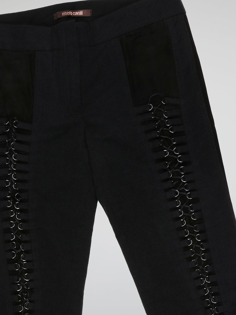 Step into elegance with these stunning Black Embellished Trousers by Roberto Cavalli. Crafted with meticulous care, each detail on these trousers tells a story of sophistication and luxury. From the delicate beaded embellishments to the figure-flattering silhouette, these trousers are a fashion statement that exudes confidence and style.