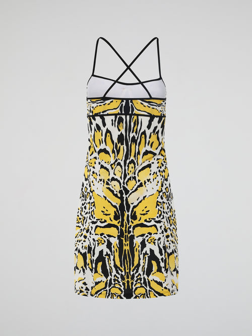 Introducing the Yellow Printed Strap Dress by Roberto Cavalli, where elegance meets vibrant playfulness. This enchanting masterpiece features a luxurious silky fabric adorned with a captivating pattern of intricate yellow hues, perfect for making a statement at any event. With its flattering silhouette and delicate straps, this dress effortlessly embodies the essence of modern glamour, promising to leave a lasting impression wherever you go.