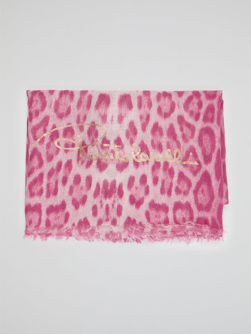 Wrap yourself in the wild elegance of this Pink Animal Print Scarf by Roberto Cavalli. The luxurious blend of soft fabric showcases a mesmerizing array of rosy hues, adorned with a fierce and playful animal motif. With each drape, let this statement accessory unleash your inner fashion safari, captivating attention wherever you go.