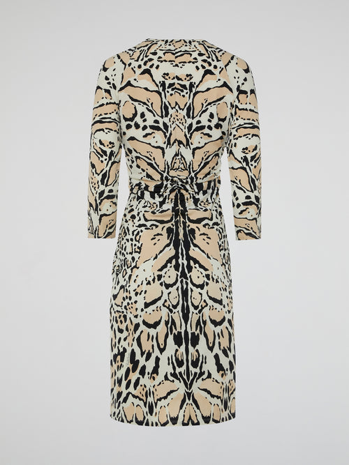 Step into the wild side of fashion with the Leopard Print Ruched Dress by Roberto Cavalli. This audaciously chic ensemble combines fierce leopard print with an artful ruched design, creating an irresistible allure. Whether it's a night on the town or an exclusive event, this dress is guaranteed to make a statement and unleash your inner untamed spirit.