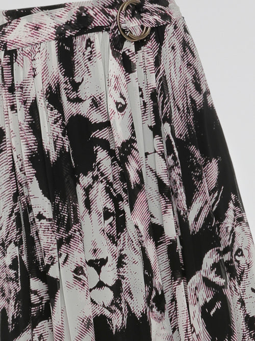 Step into the wild side with the Animal Print Pleated Maxi Dress by Roberto Cavalli. This captivating dress features a mesmerizing animal print pattern that embodies fierceness and elegance. Its pleated design effortlessly flows with every step, creating a striking silhouette that will make heads turn wherever you go.