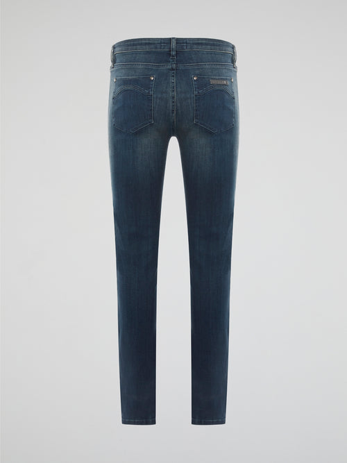 Elevate your denim game with these Stone Washed Skinny Denim Jeans by Roberto Cavalli, designed to hug your curves in all the right places. The unique stone wash finish gives these jeans a worn-in, vintage look that sets them apart from your average pair of skinny jeans. Pair them with a sleek blouse and heels for a chic and edgy urban look that will turn heads wherever you go.