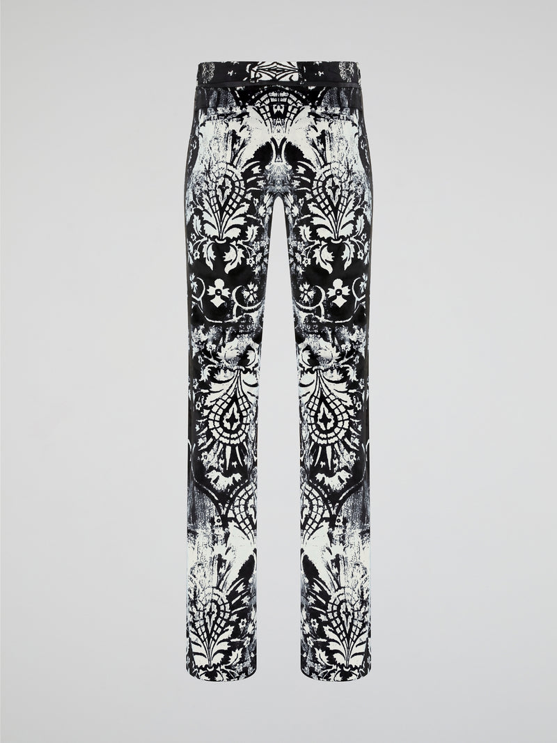 Elevate your wardrobe with our Roberto Cavalli Printed Skinny Trousers, designed to make a bold fashion statement. Crafted from luxurious fabrics and featuring a vibrant print, these trousers are the perfect combination of style and comfort. Whether you're heading to the office or a night out on the town, these trousers will ensure all eyes are on you.