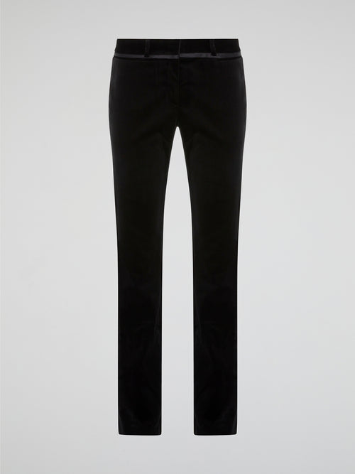 Step out in style with these sleek and sophisticated Black Skinny Trousers by Roberto Cavalli. Crafted from luxurious, high-quality fabric, these trousers hug your curves in all the right places for a flattering fit. Whether you're heading to a board meeting or a night out on the town, these trousers will elevate any outfit with a touch of Italian glamour.