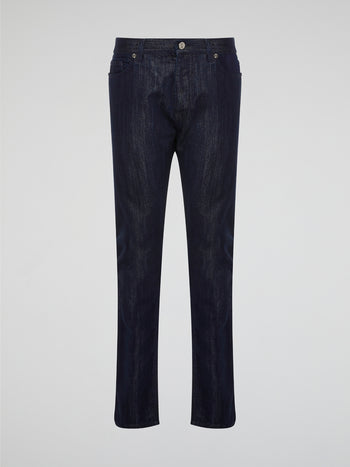 Elevate your denim game with these sleek Navy Slim Fit Jeans by Roberto Cavalli, perfect for the modern man who values style and sophistication. Crafted from high-quality denim with a hint of stretch, these jeans provide a comfortable and flattering fit that will keep you looking sharp all day long. Pair them with a crisp white shirt and sneakers for a laid-back yet polished ensemble that will turn heads wherever you go.