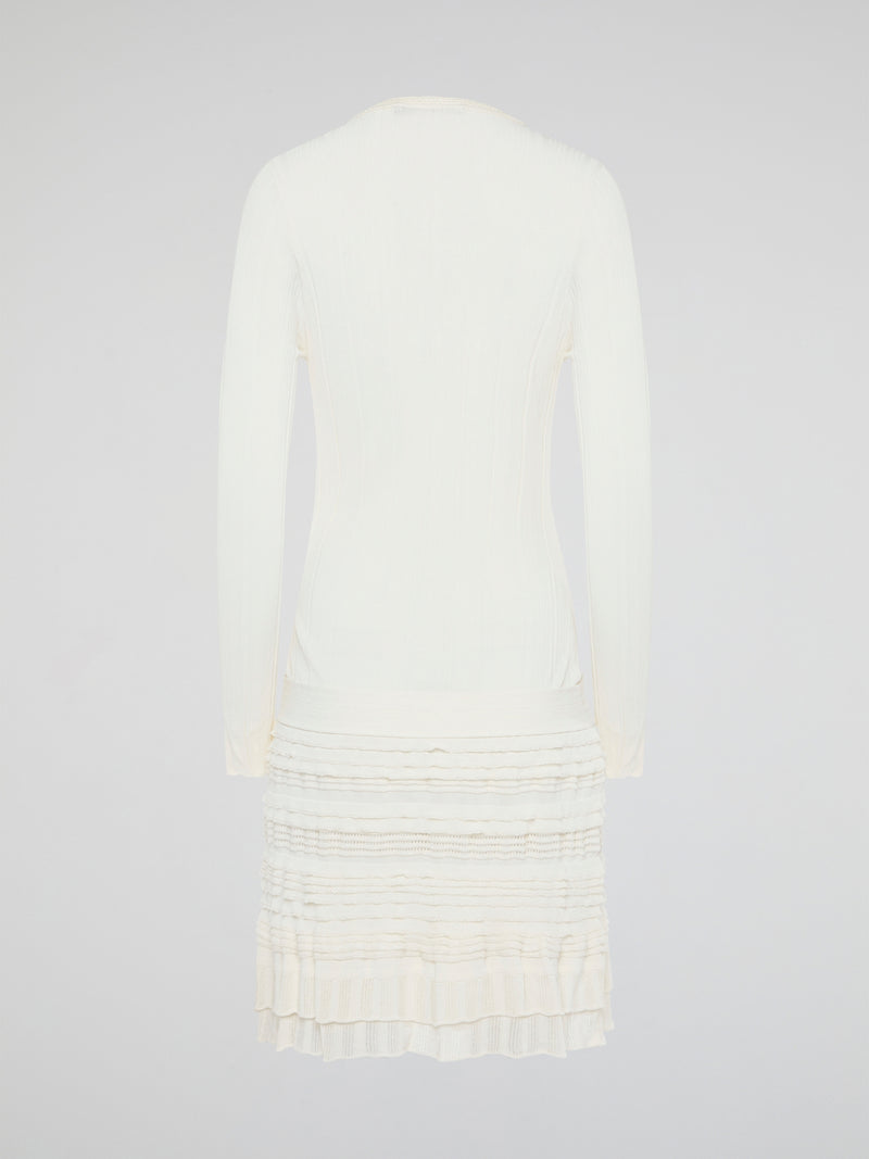 Elevate your winter wardrobe with the luxurious White Knitted Sweater Dress by Roberto Cavalli. This chic and sophisticated piece features intricate knit detailing and a flattering silhouette that will turn heads wherever you go. Whether you're dressing it up with heels for a night out or styling it casually with boots, this sweater dress is sure to make a statement.