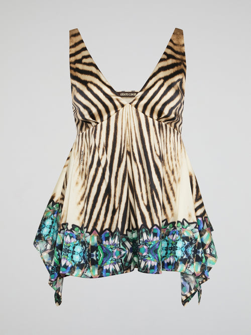 Embrace your wild side with this fierce Animal Print Flared Top by Roberto Cavalli. The bold print and flowy silhouette will make you stand out in any crowd, while the luxurious fabric ensures comfort all day long. Pair it with sleek black pants or rock it with denim for a versatile and stylish look that is sure to turn heads.