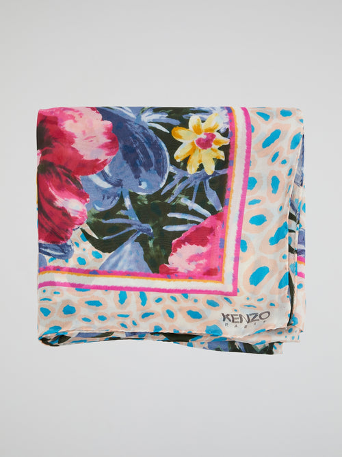 Wrap yourself in vibrant elegance with the Floral Print Scarf from Kenzo. This luxurious accessory features a stunning floral motif that adds a pop of color to any outfit. Crafted from sumptuously soft fabric, this scarf is a must-have for those who appreciate both style and comfort.