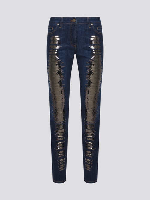 Sparkle and shine in style with these navy sequin embellished jeans by Roberto Cavalli. With a touch of glam and a hint of luxury, these jeans are perfect for adding a touch of sophistication to any outfit. Stand out from the crowd and make a statement with these dazzling denim pants.