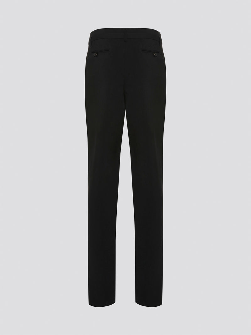 Step up your style game with these chic Black Belted Pleated Trousers by Roberto Cavalli, designed to make a statement. The flattering pleats and elegant belt detailing give these trousers a sophisticated edge, perfect for any fashion-forward individual. Whether worn to the office or a night out on the town, these trousers are sure to turn heads and leave a lasting impression.