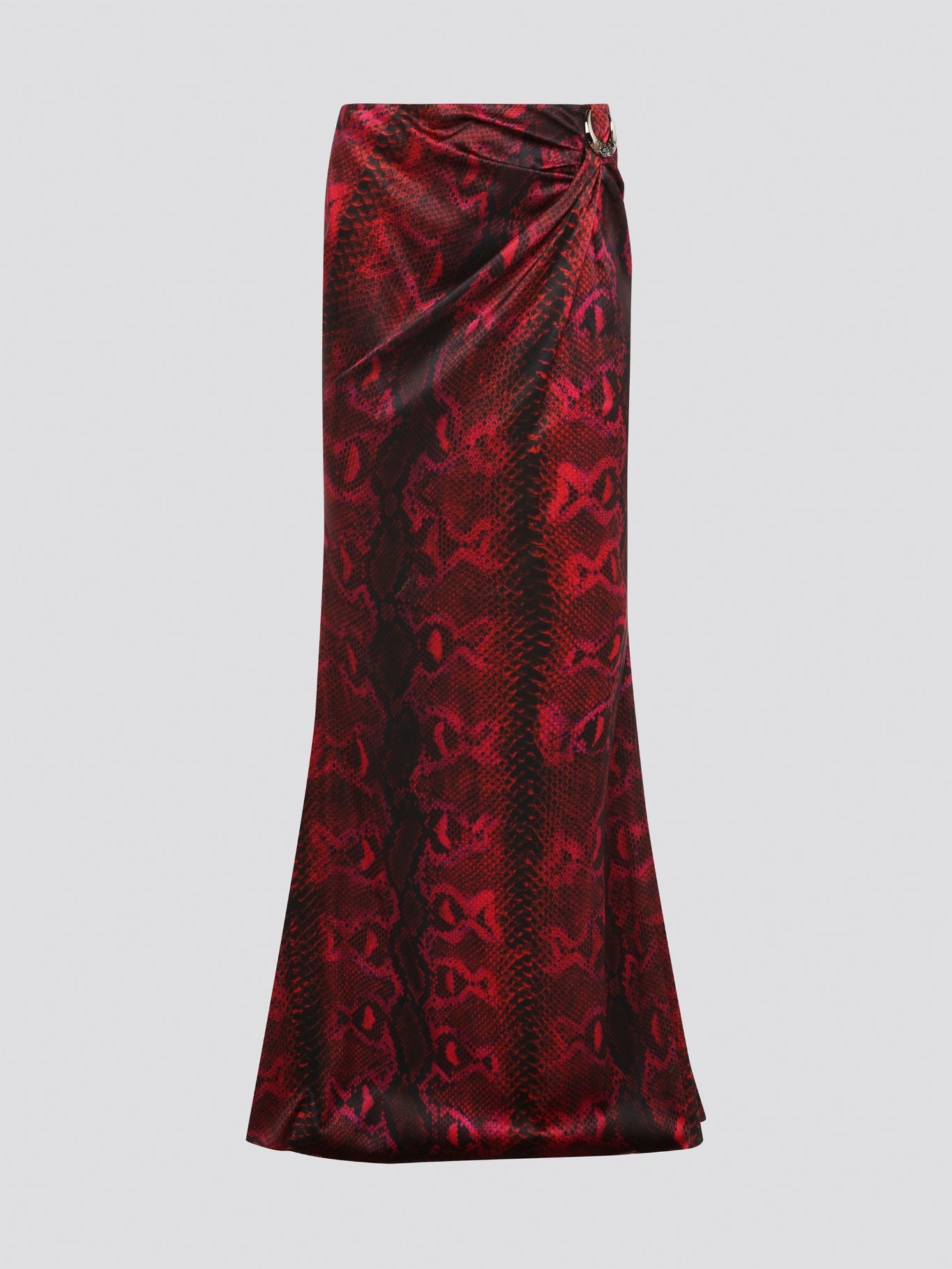 Make a fierce fashion statement with the Red Snake Print Draped Skirt by Roberto Cavalli. This bold and exotic piece features a striking snake print design that will turn heads wherever you go. The draped silhouette adds a touch of drama and sophistication, making it the perfect choice for a night out on the town.