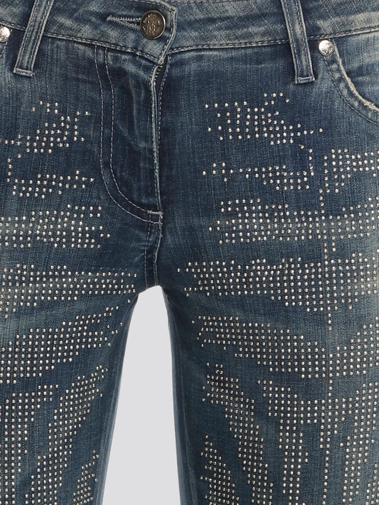 Unleash your inner rockstar with these statement-making Blue Studded Denim Jeans by Roberto Cavalli. The edgy studs add a touch of glamour to the classic denim silhouette, making these jeans a must-have for any fashion-forward individual. Stand out from the crowd and elevate your wardrobe with these show-stopping jeans that are sure to turn heads wherever you go.