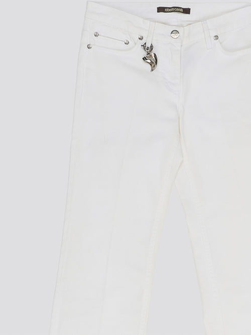 Elevate your denim game with these stunning White Wide Leg Denim Jeans from Roberto Cavalli. Crafted from premium quality denim, these jeans feature a sophisticated wide leg silhouette that exudes elegance and style. Perfect for day or night, these jeans are a versatile must-have addition to your wardrobe.