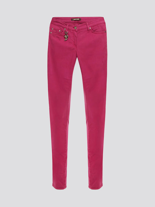 Step out in style with these Pink Skinny Denim Jeans from Roberto Cavalli, the epitome of high fashion and luxury. Crafted with precision and attention to detail, the vibrant pink color adds a fun and feminine touch to your wardrobe. Whether you dress them up or down, these jeans are sure to make a statement wherever you go.