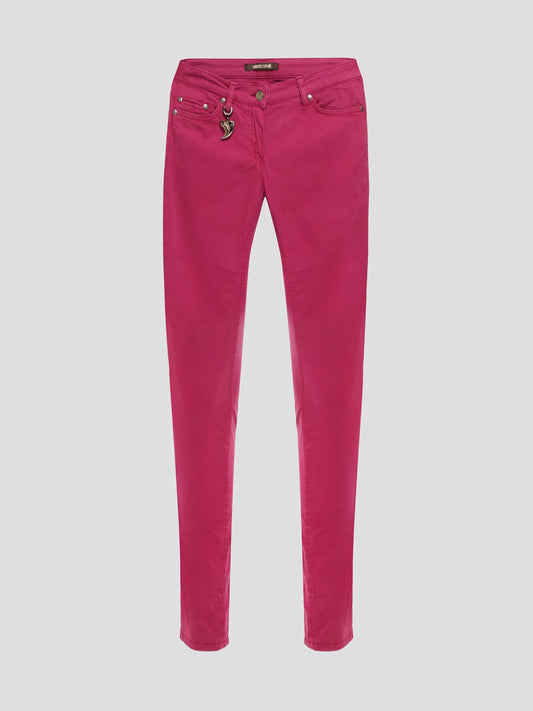 Step out in style with these Pink Skinny Denim Jeans from Roberto Cavalli, the epitome of high fashion and luxury. Crafted with precision and attention to detail, the vibrant pink color adds a fun and feminine touch to your wardrobe. Whether you dress them up or down, these jeans are sure to make a statement wherever you go.