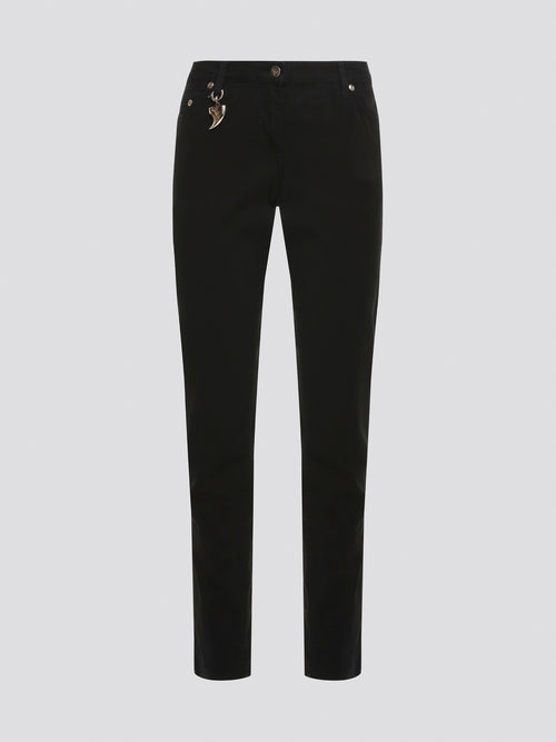 Step out in style with these sleek and versatile Black Skinny Fit Jeans from Roberto Cavalli. Made from premium quality denim, these jeans hug your curves in all the right places while offering unbeatable comfort. Whether dressed up with heels or down with sneakers, these jeans are a must-have for any fashion-forward wardrobe.