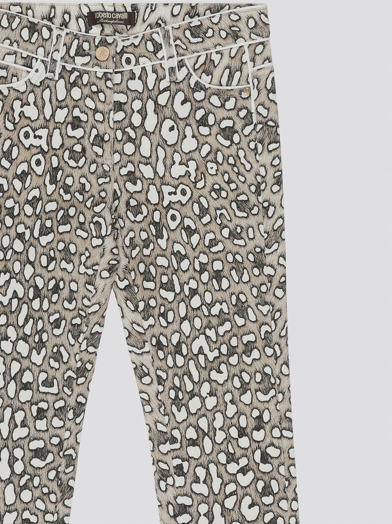 Unleash your wild side with these fierce Leopard Print Straight Cut Jeans from Roberto Cavalli. Made for the fashion-forward individual who isn't afraid to stand out from the crowd, these statement jeans are sure to turn heads wherever you go. Embrace your inner animal and strut your stuff in style with these edgy and on-trend jeans.