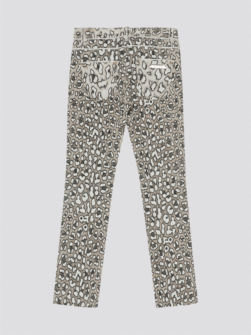 Unleash your wild side with these fierce Leopard Print Straight Cut Jeans from Roberto Cavalli. Made for the fashion-forward individual who isn't afraid to stand out from the crowd, these statement jeans are sure to turn heads wherever you go. Embrace your inner animal and strut your stuff in style with these edgy and on-trend jeans.