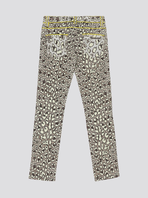 Step into fierce style with these Leopard Print Wide Leg Jeans by Roberto Cavalli. Embrace your wild side with the bold leopard print pattern that is sure to make a statement wherever you go. The wide leg silhouette adds a touch of elegance to these edgy jeans, perfect for a fashion-forward look.