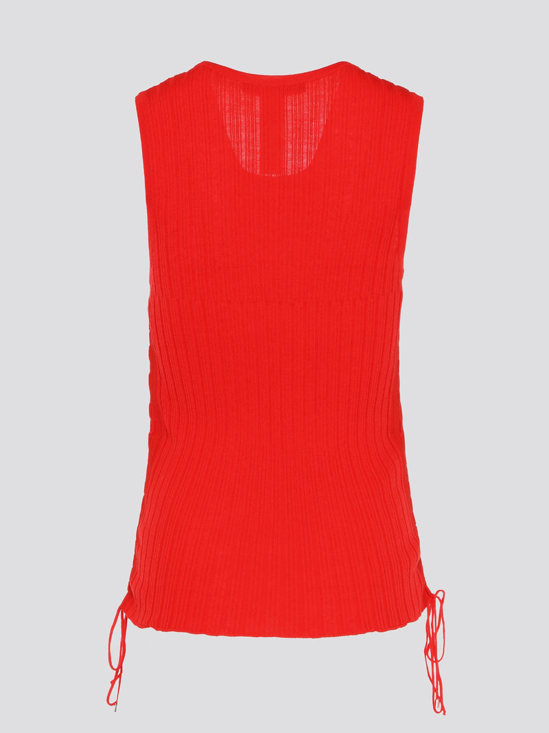 Add a pop of vibrant color to your wardrobe with our stunning Red Sleeveless Knitted Top by Roberto Cavalli. This striking top features a luxurious knit design that hugs your curves in all the right places, making it both comfortable and flattering. Whether you're heading to a stylish brunch or a night out on the town, this top is sure to turn heads and make a bold fashion statement.