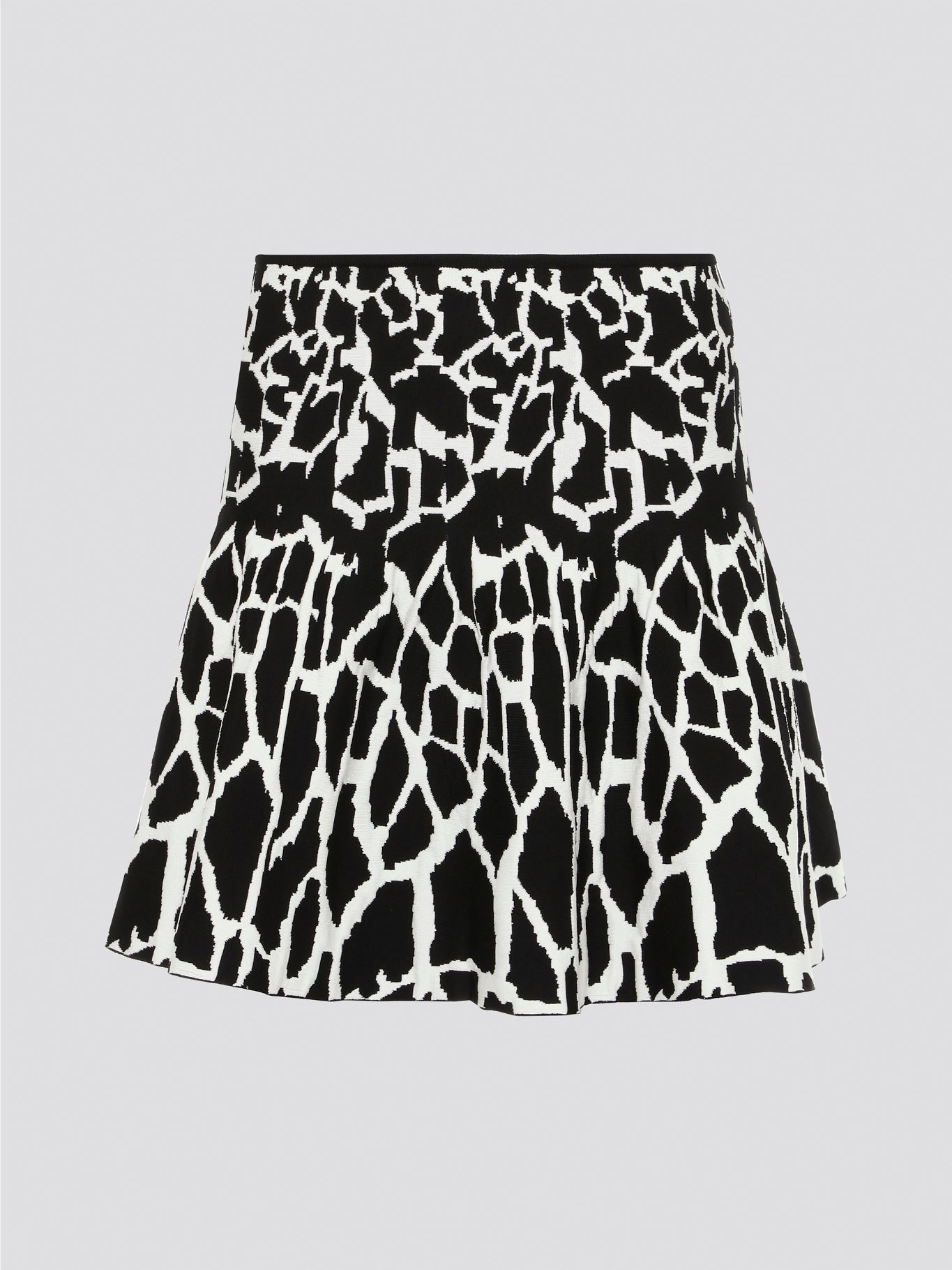 Turn heads with the vibrant and bold Contrast Print Flared Mini Skirt by Roberto Cavalli. The eye-catching design features a mix of geometric patterns and vivid colors, perfect for making a statement. Embrace your playful side and add a touch of luxury to your wardrobe with this unique and stylish piece.