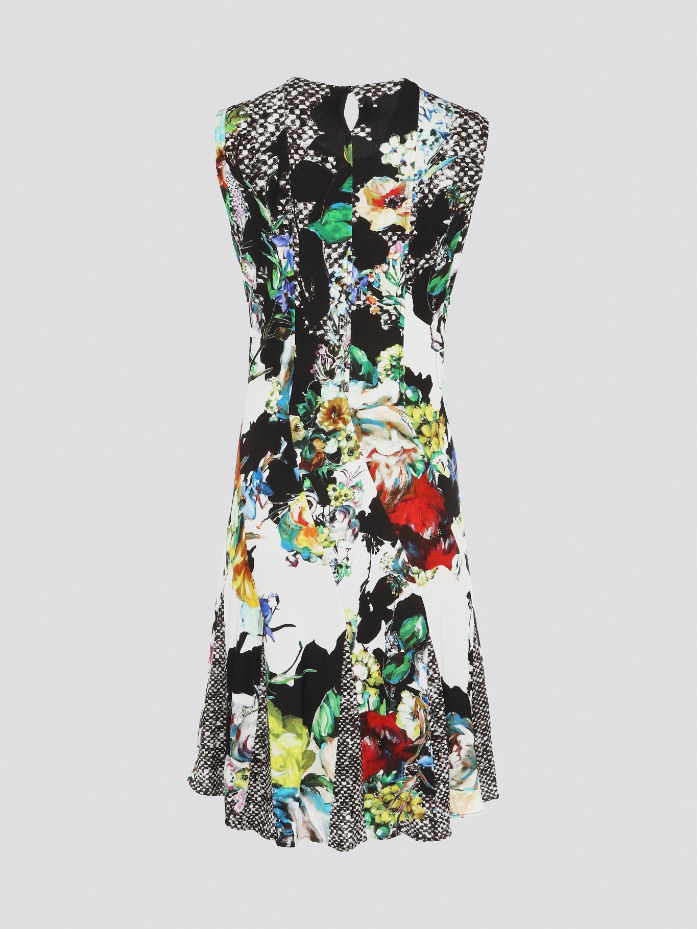 Indulge in the wild beauty of nature with the Foliage Sheath Dress by Roberto Cavalli. This exquisite piece showcases intricate leaf motifs that dance across the fabric, creating a mesmerizing blend of elegance and edge. Perfect for the modern woman who dares to stand out and make a bold fashion statement.