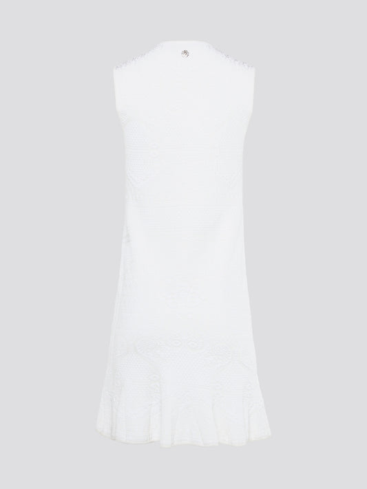 Feel effortlessly chic and sophisticated in this stunning White Sleeveless Mini Dress by Roberto Cavalli. The epitome of Italian luxury, the dress features a flattering silhouette and intricate detailing that is sure to turn heads. Perfect for any occasion, whether it's a summer soirée or a glamorous night out, this dress is a must-have for any fashion-forward woman.