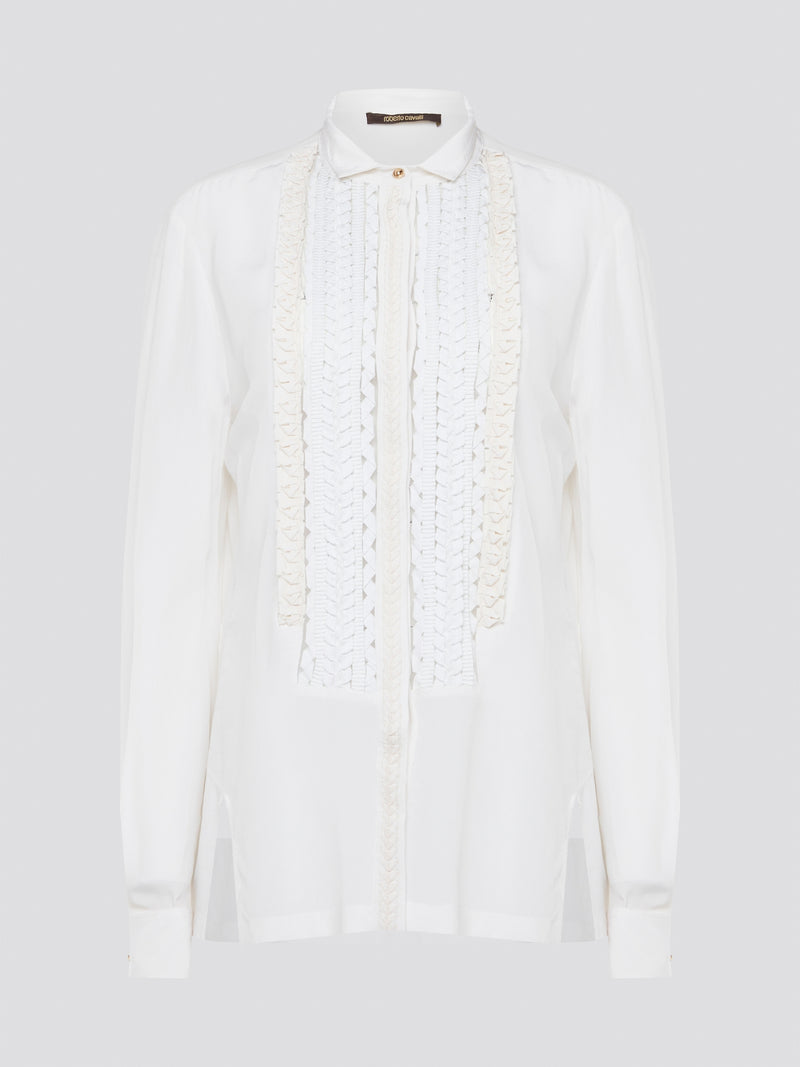 Elevate your wardrobe with this stunning Roberto Cavalli white detailed long sleeve shirt. Crafted with exquisite attention to detail, this shirt features intricate embroidery and embellishments that exude luxury and elegance. Perfect for adding a touch of sophistication to any ensemble, this statement piece is sure to turn heads wherever you go.