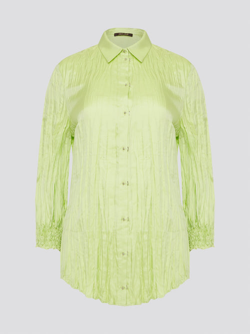 Step into the wild side with this striking green crinkled shirt from Roberto Cavalli. The vibrant hue and unique texture of the fabric will ensure you stand out from the crowd wherever you go. Embrace your fearless fashion sense and unleash your inner style icon with this must-have statement piece.