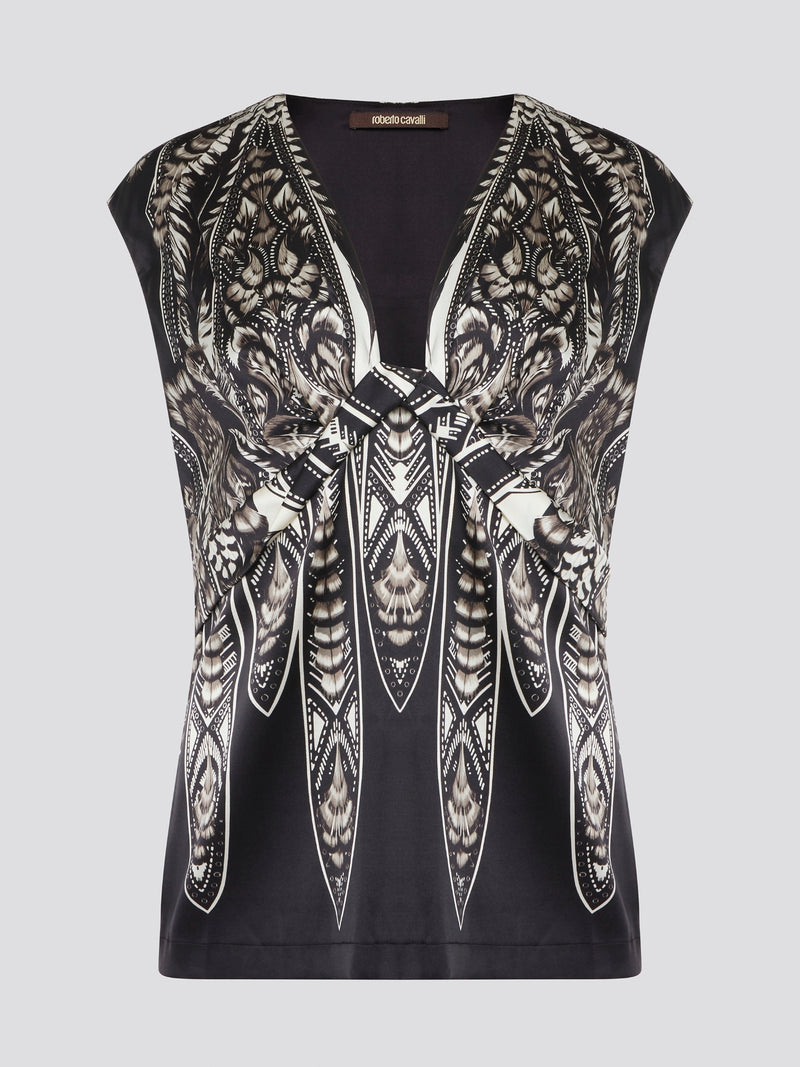 Elevate your summer wardrobe with this effortlessly chic Black Printed Sleeveless Top from Roberto Cavalli. Crafted from luxurious materials, this top features a striking print that is sure to turn heads wherever you go. Pair it with tailored pants for a sophisticated office look, or dress it down with jeans for a casual weekend ensemble.