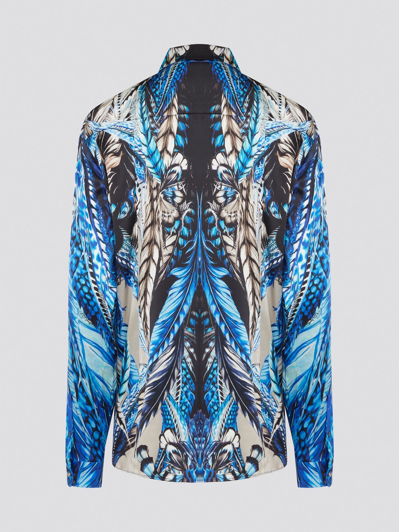 Elevate your wardrobe with the stunning Blue Printed Long Sleeve Blouse by Roberto Cavalli. Featuring a bold and striking print, this blouse is perfect for making a statement wherever you go. Crafted with exquisite attention to detail, this piece will add a touch of luxury and sophistication to any outfit.