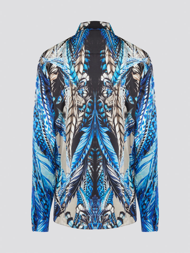 Elevate your wardrobe with the stunning Blue Printed Long Sleeve Blouse by Roberto Cavalli. Featuring a bold and striking print, this blouse is perfect for making a statement wherever you go. Crafted with exquisite attention to detail, this piece will add a touch of luxury and sophistication to any outfit.