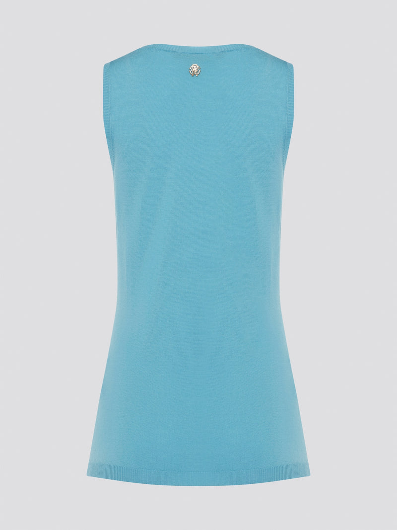 Dive into a sea of luxury with our Blue Sleeveless Top by Roberto Cavalli. Crafted from high-quality materials, this top exudes sophistication and style. Perfect for layering or wearing on its own, this top will elevate any outfit with its stunning blue hue and chic design.