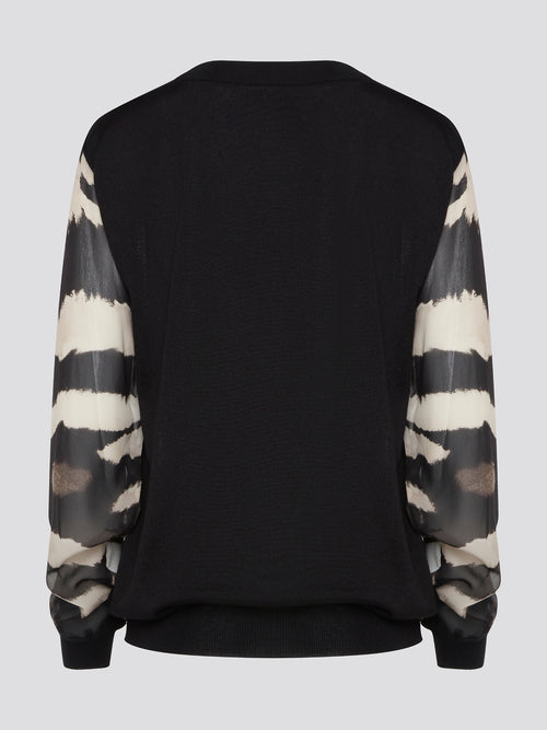 Make a fierce fashion statement with the Roberto Cavalli Zebra Print Sweatshirt, featuring a bold and eye-catching zebra print design. Crafted from premium materials, this sweatshirt offers both style and comfort for all-day wear. Elevate your street style with this standout piece that is sure to turn heads wherever you go.