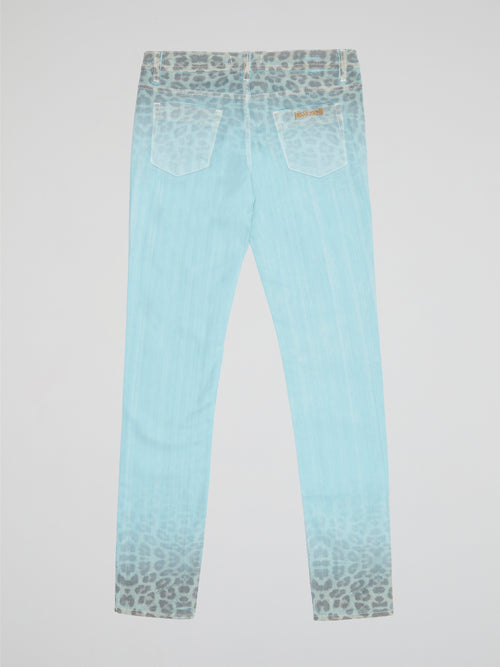 Unleash your wild side with these Blue Leopard Gradient Pants by Just Cavalli. Crafted from luxurious fabric that hugs your curves in all the right places, these pants feature a mesmerizing gradient pattern that transitions from deep indigo to fierce leopard print. Step out in style and make a statement with these bold and trendy pants that are sure to turn heads wherever you go.